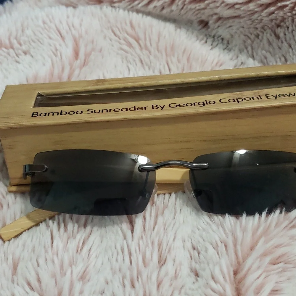 A pair of brand new Bamboo Sunreader by Georgio Caponi!